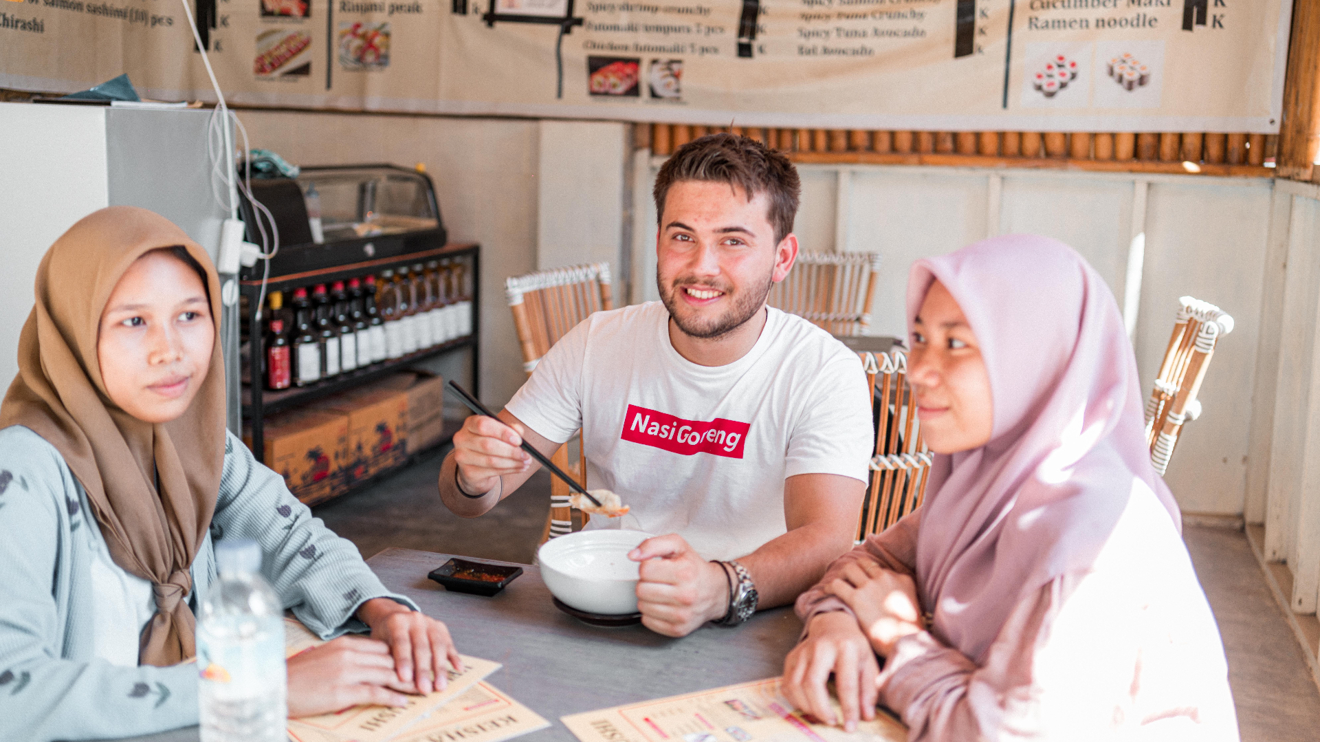 Guests eating at Keisha Sushi